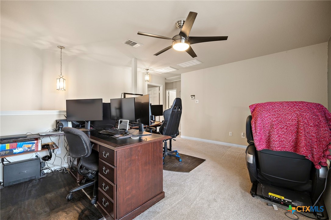 326 Comal Run Hutto, TX 78634 - Photo 20 of 23 a workspace with furniture and screen