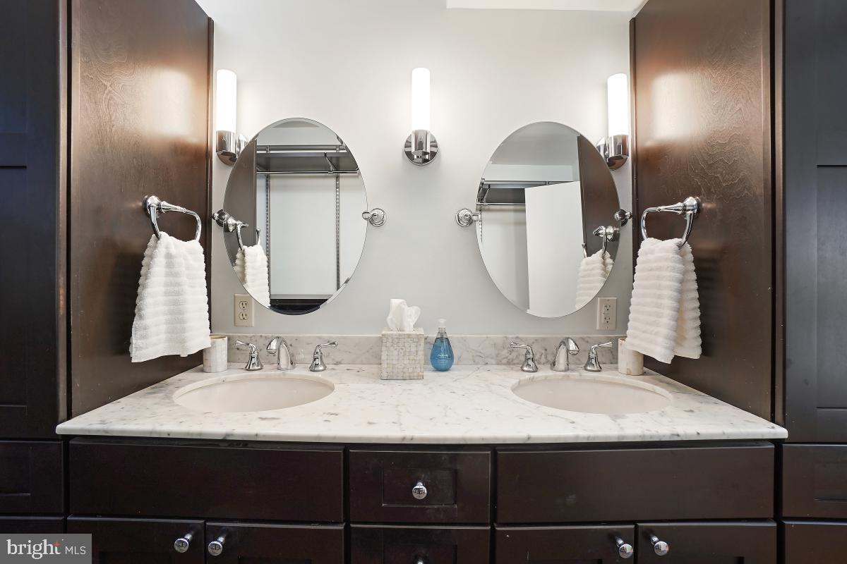 1935 Lyttonsville Road, Unit 1935 Silver Spring, MD 20910 - Photo 27 of 33 Amazing custom vanity and custom closet fittings