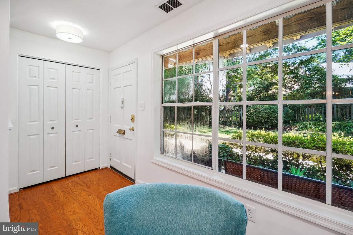 1935 Lyttonsville Road, Unit 1935 Silver Spring, MD 20910 - Photo 4 of 33 Enormous wall of windows to let in the sunlight