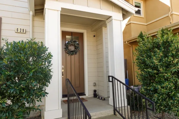 a view of a house with a street