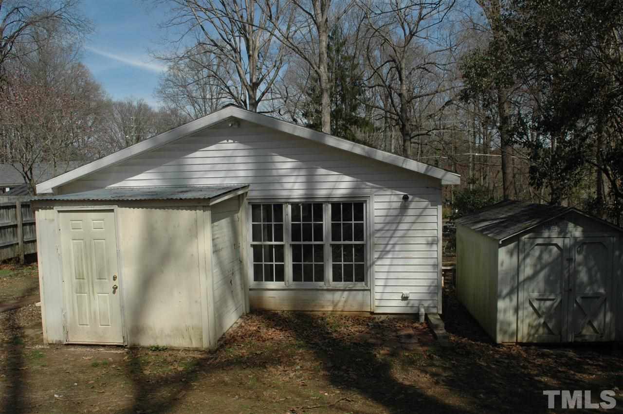 3208 Barker Place Raleigh, NC 27604 - Photo 5 of 10 View of detached workshop and detached storage building. Fenced yard.
