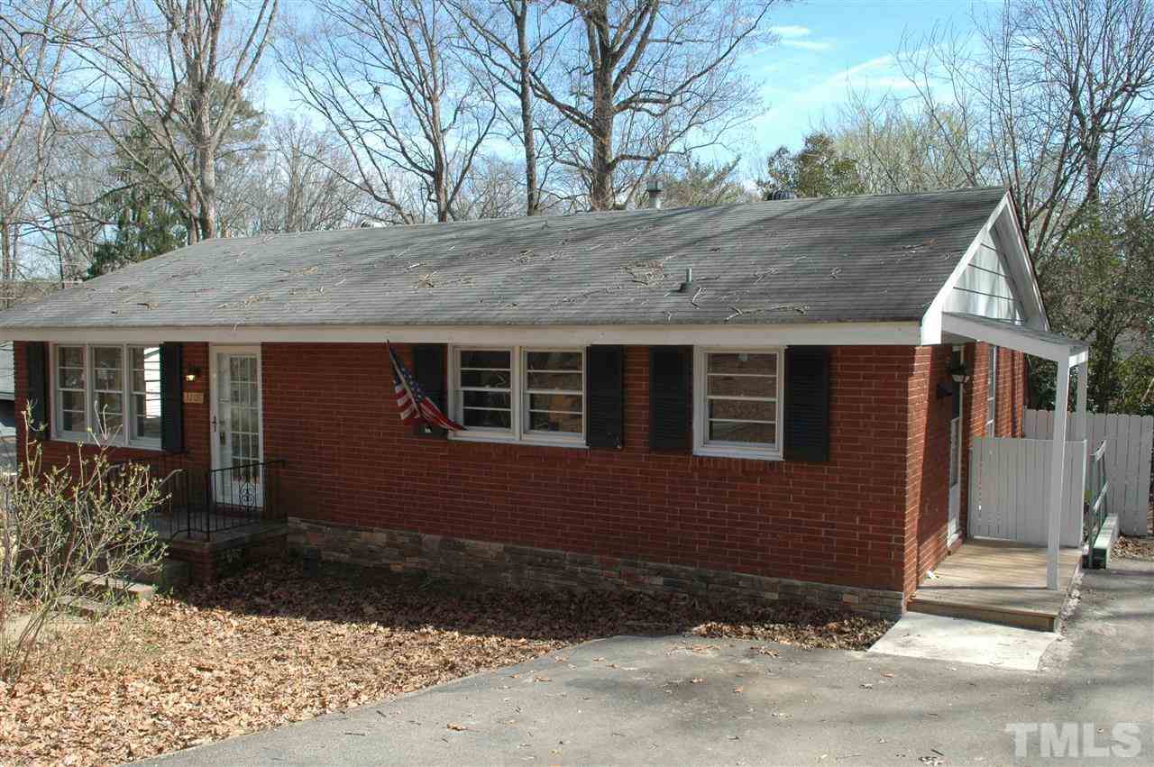 3208 Barker Place Raleigh, NC 27604 - Photo 10 of 10 Another view of exterior front showing asphalt driveway and parking pad.