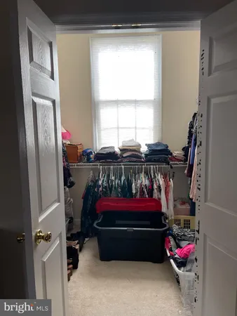a bathroom with a tub and shower