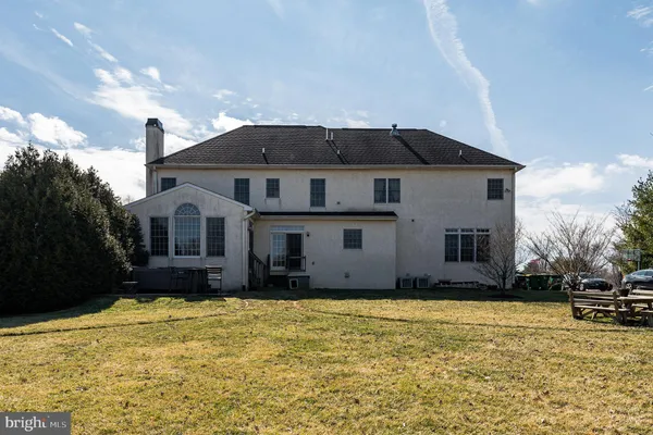 a view of a yard with an outdoor space