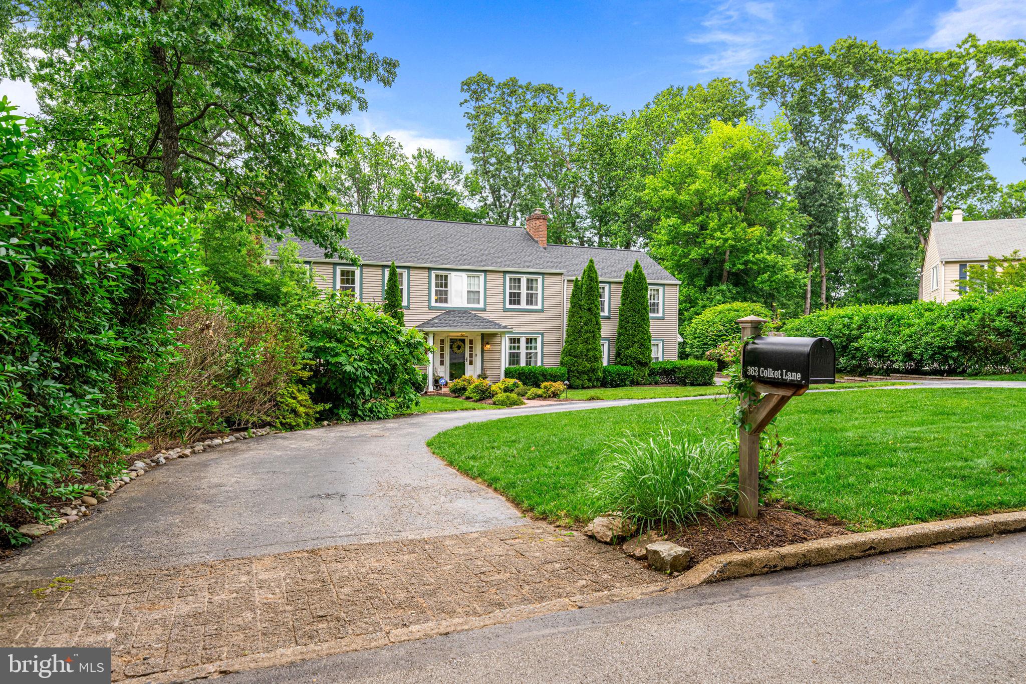 363 Colket Lane Wayne, PA 19087 - Photo 2 of 52 a front view of a house with a garden