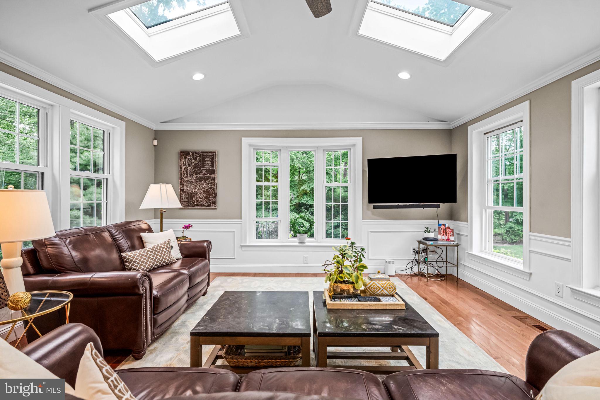 363 Colket Lane Wayne, PA 19087 - Photo 23 of 52 a living room with furniture fireplace and flat screen tv