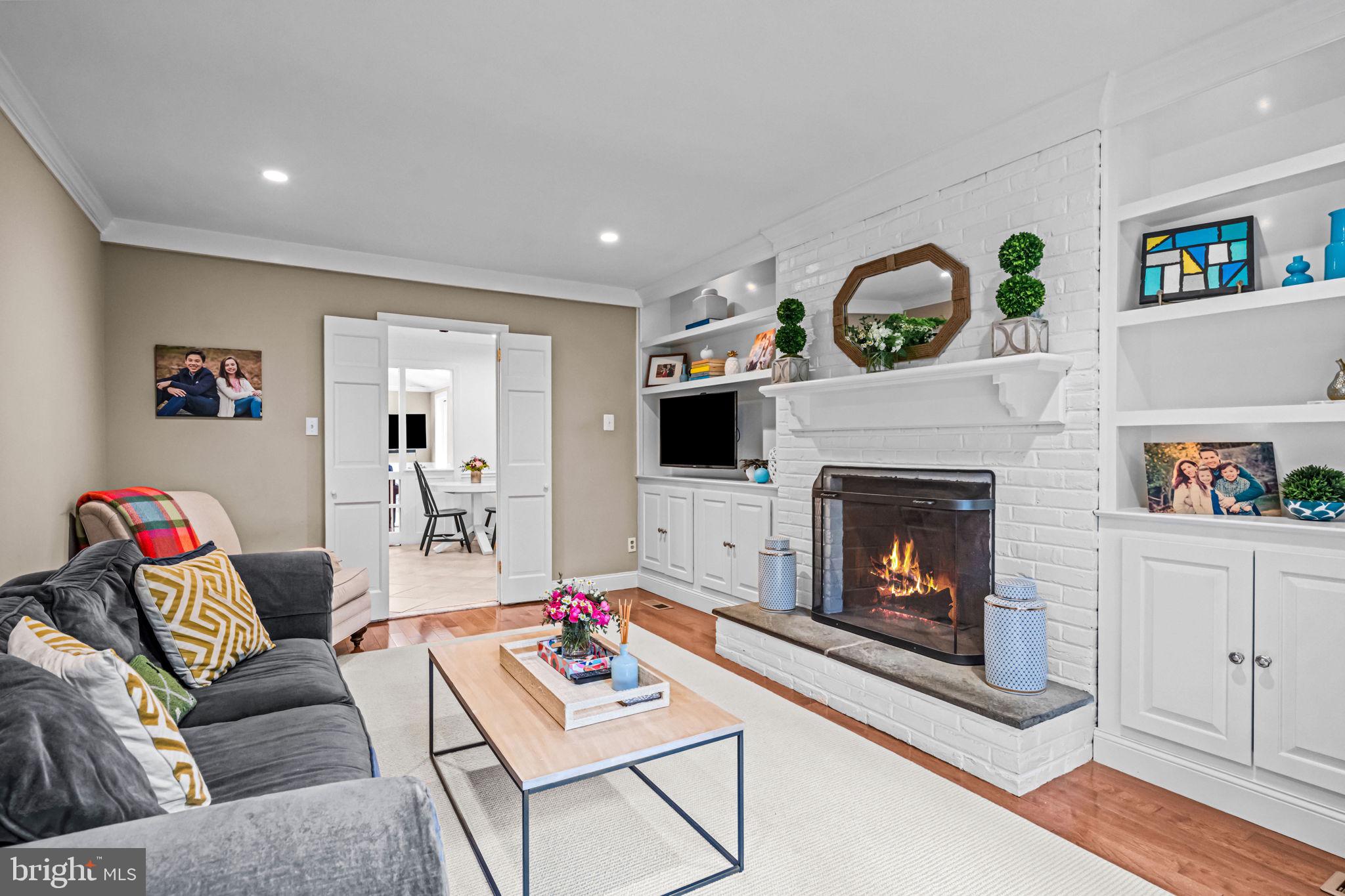 363 Colket Lane Wayne, PA 19087 - Photo 25 of 52 a living room with furniture and a fireplace