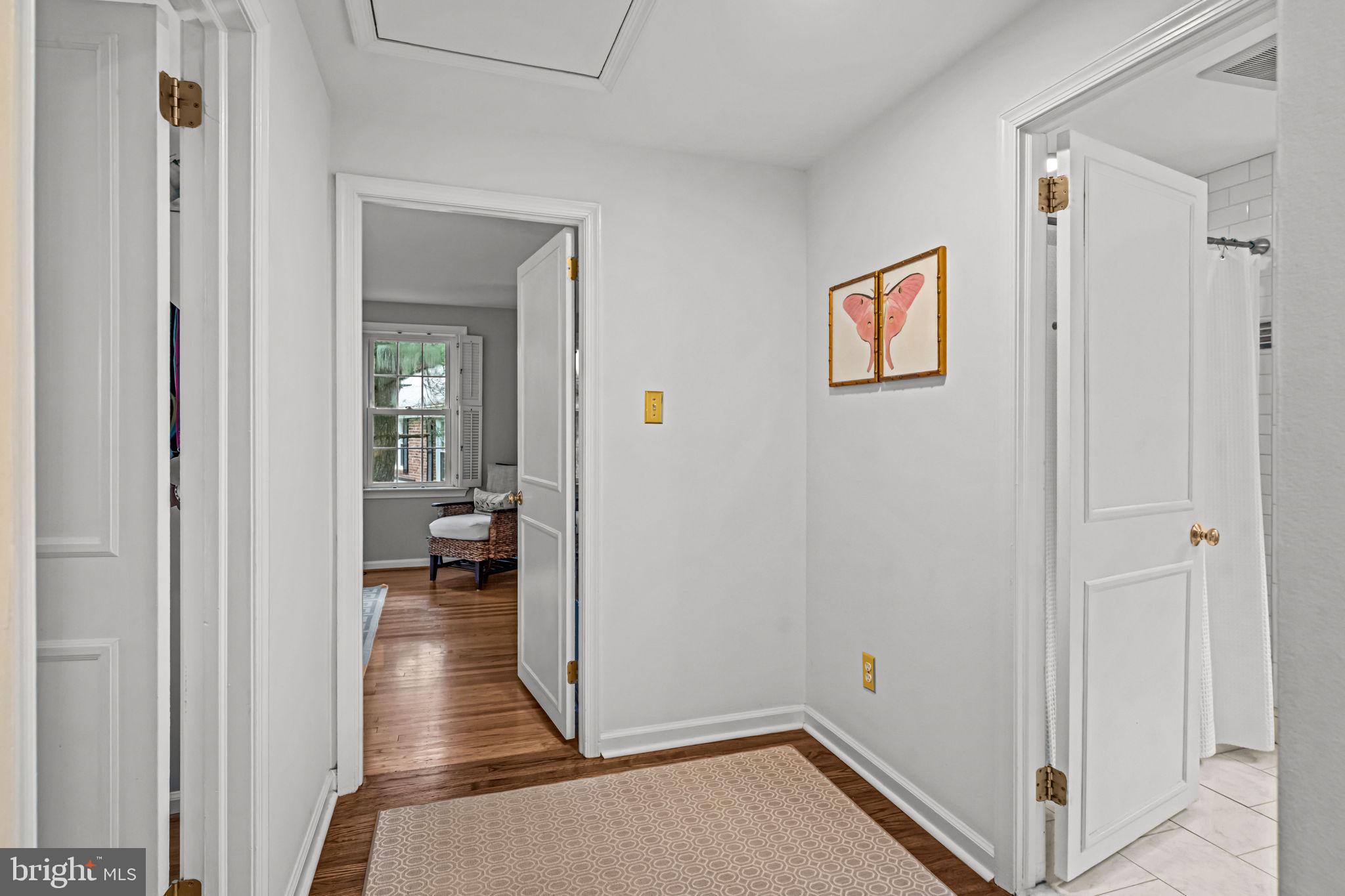 363 Colket Lane Wayne, PA 19087 - Photo 26 of 52 a view of a hallway with wooden floor and a living room