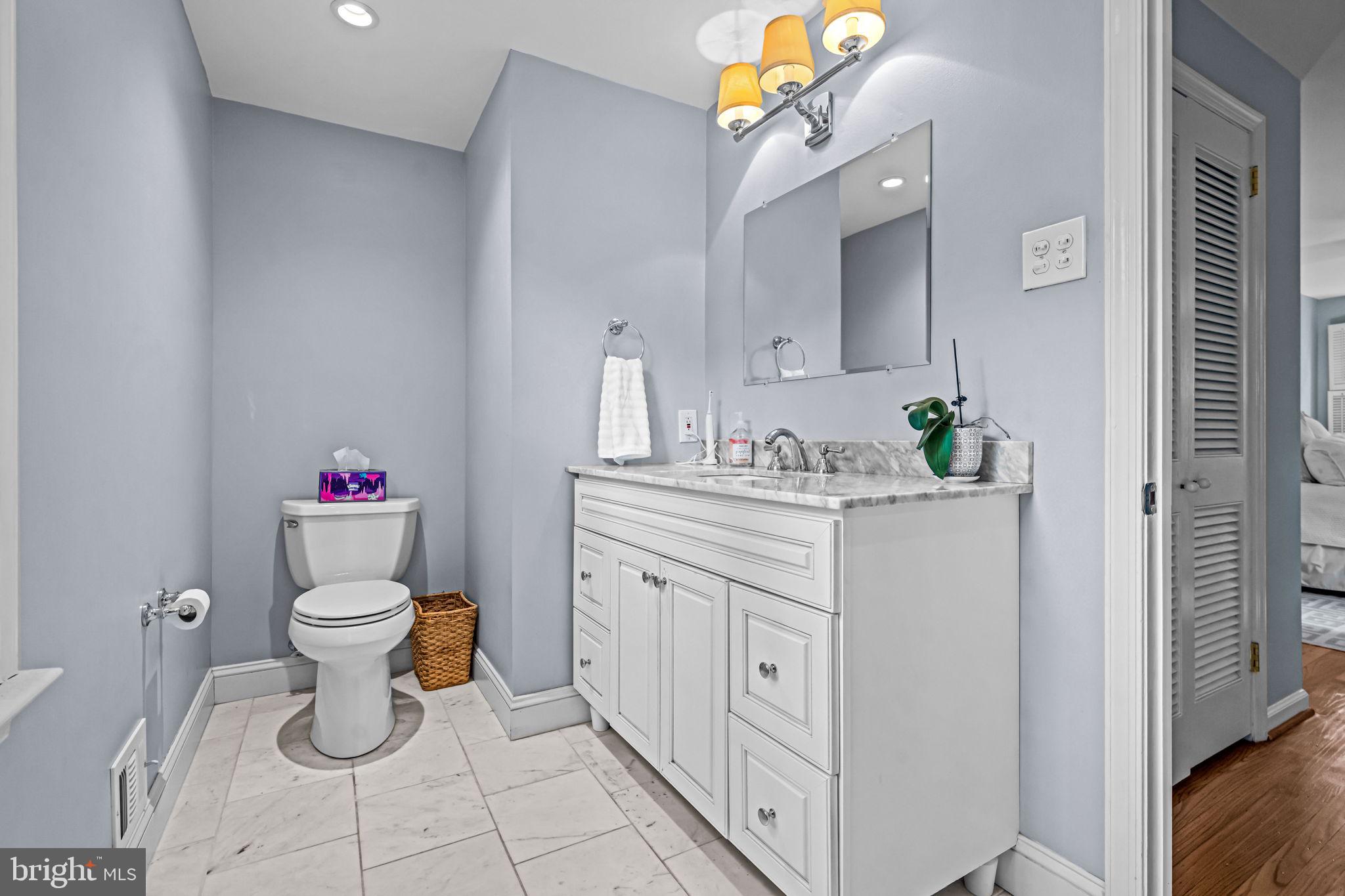 363 Colket Lane Wayne, PA 19087 - Photo 30 of 52 a bathroom with a sink vanity and a toilet