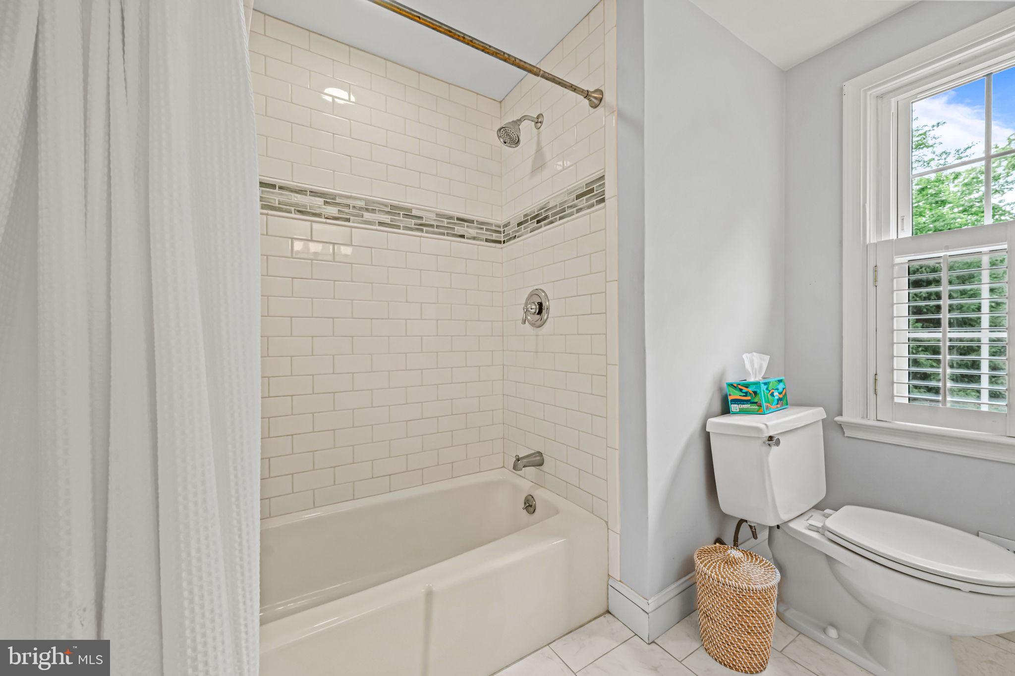363 Colket Lane Wayne, PA 19087 - Photo 36 of 52 a bathroom with a sink mirror toilet and bathtub