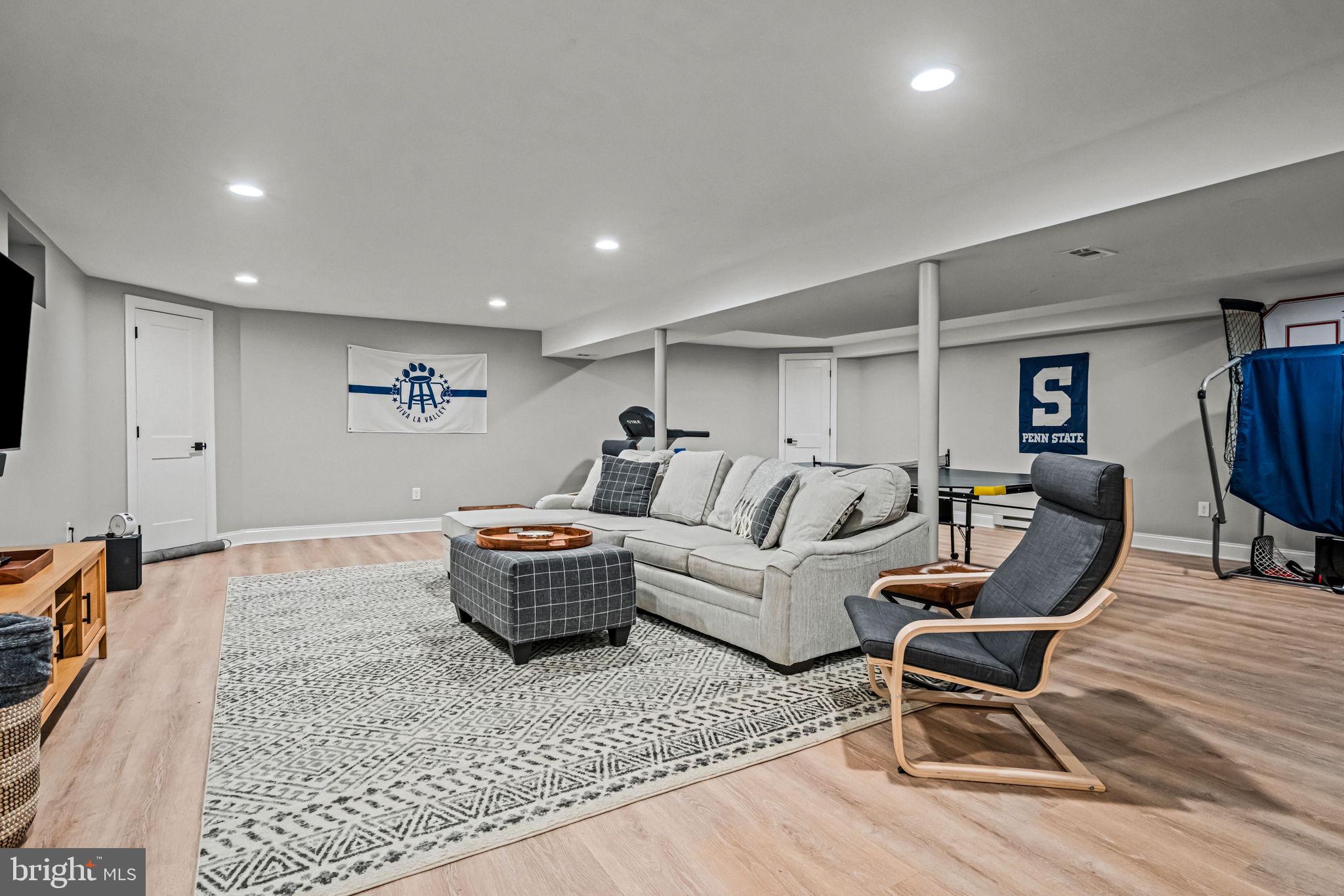 363 Colket Lane Wayne, PA 19087 - Photo 41 of 52 a living room with furniture and a flat screen tv