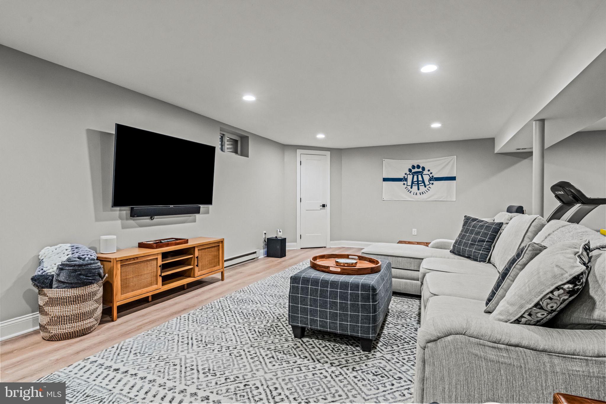363 Colket Lane Wayne, PA 19087 - Photo 42 of 52 a living room with furniture and a flat screen tv