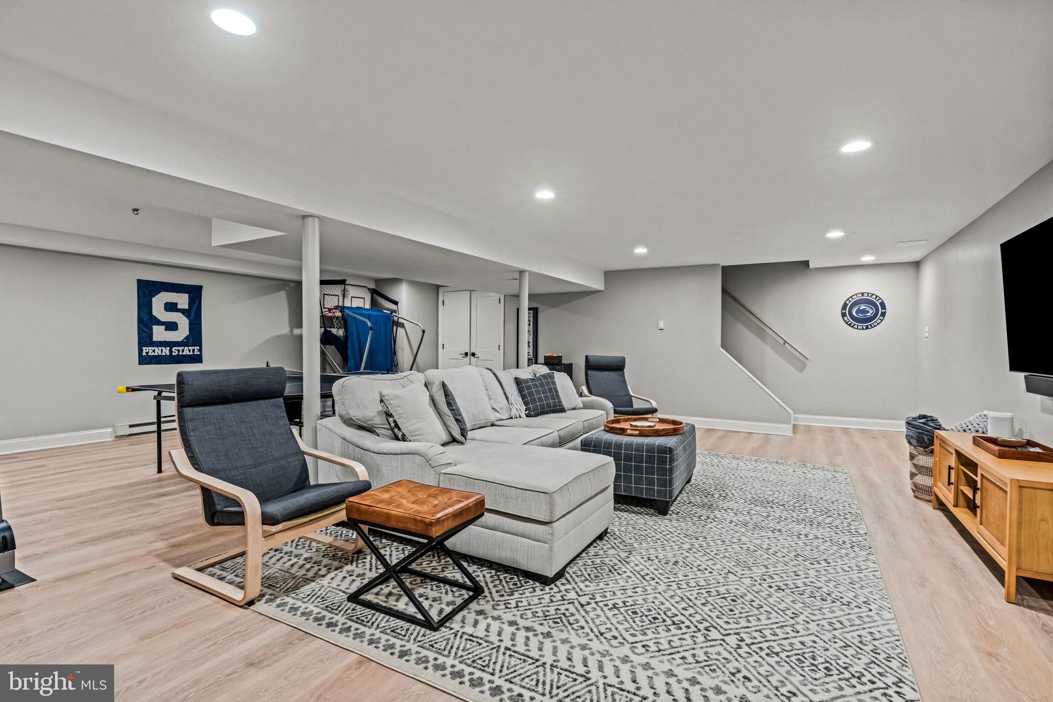 363 Colket Lane Wayne, PA 19087 - Photo 44 of 52 a living room with furniture and a flat screen tv