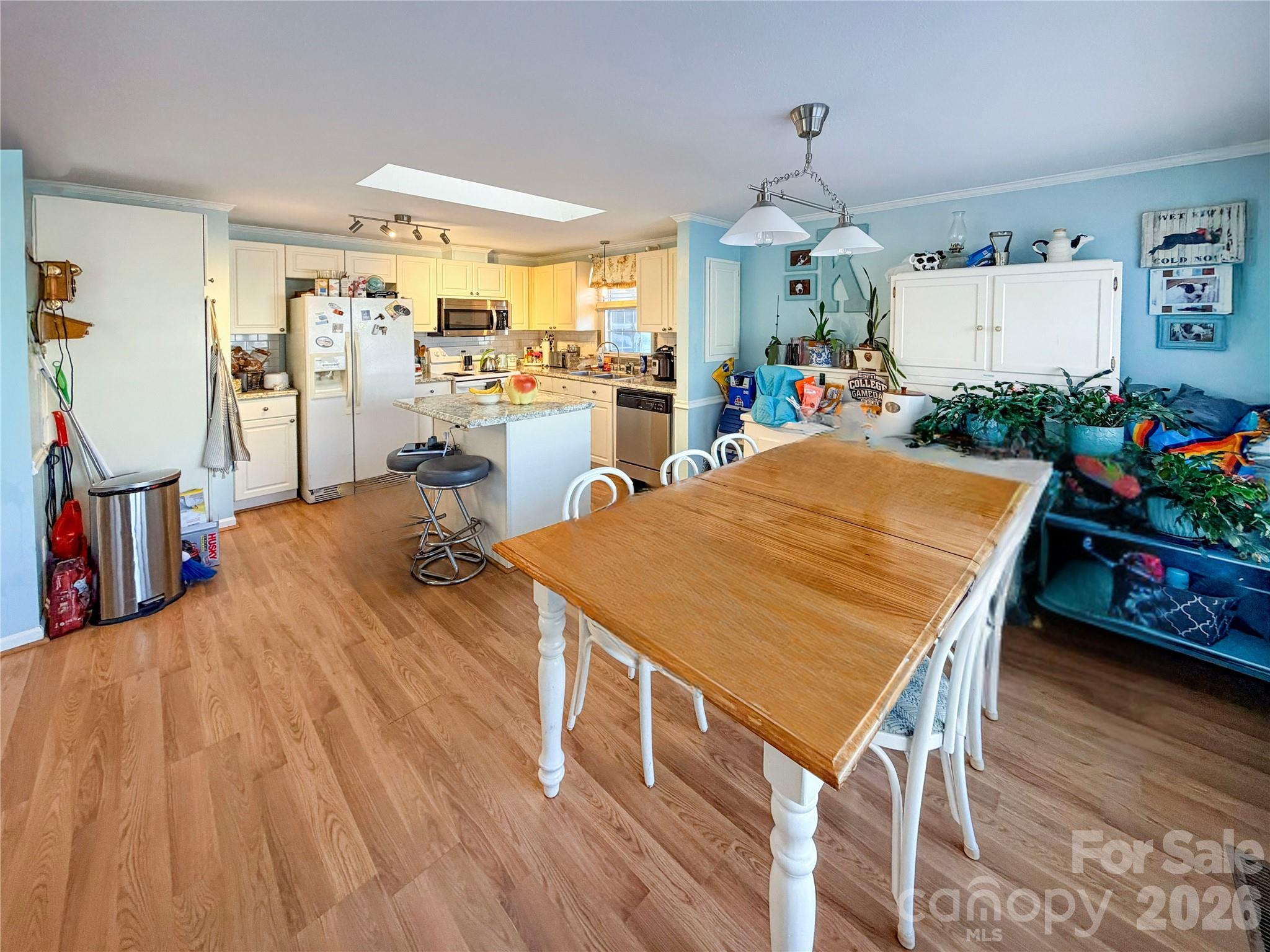 145 Goneaway Lane Cleveland, NC 27013 - Photo 5 of 12 a very nice looking dining room with kitchen island wooden floor and center island