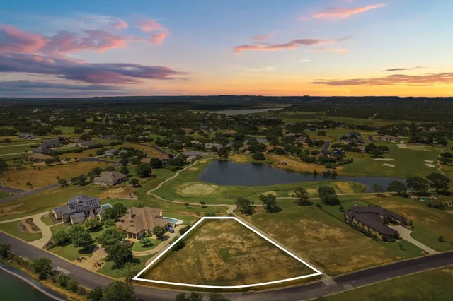 a view of a lake from a city