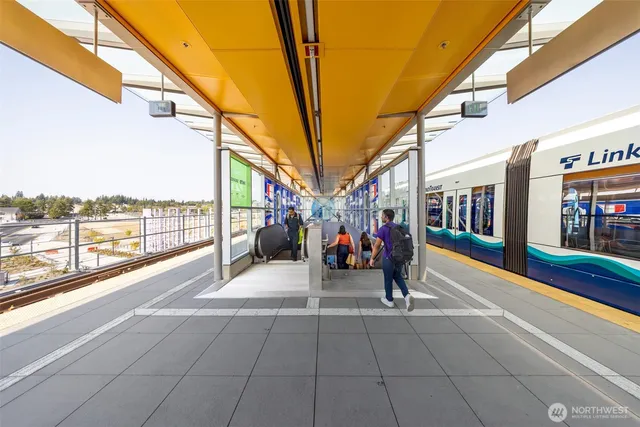 a view of railway station with sitting area