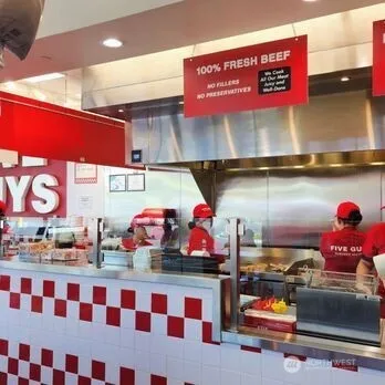 a group of people sitting in a room