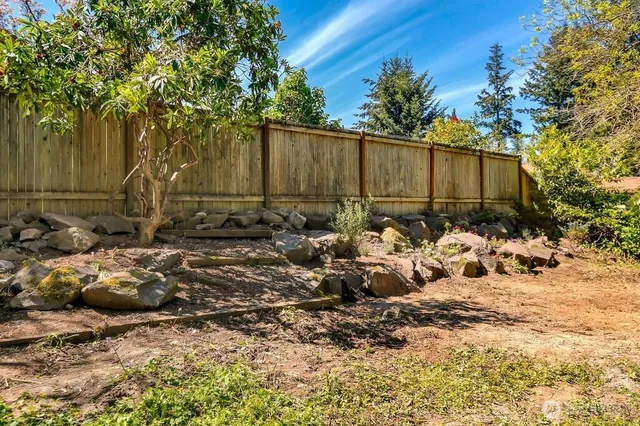a view of a yard with an outdoor space