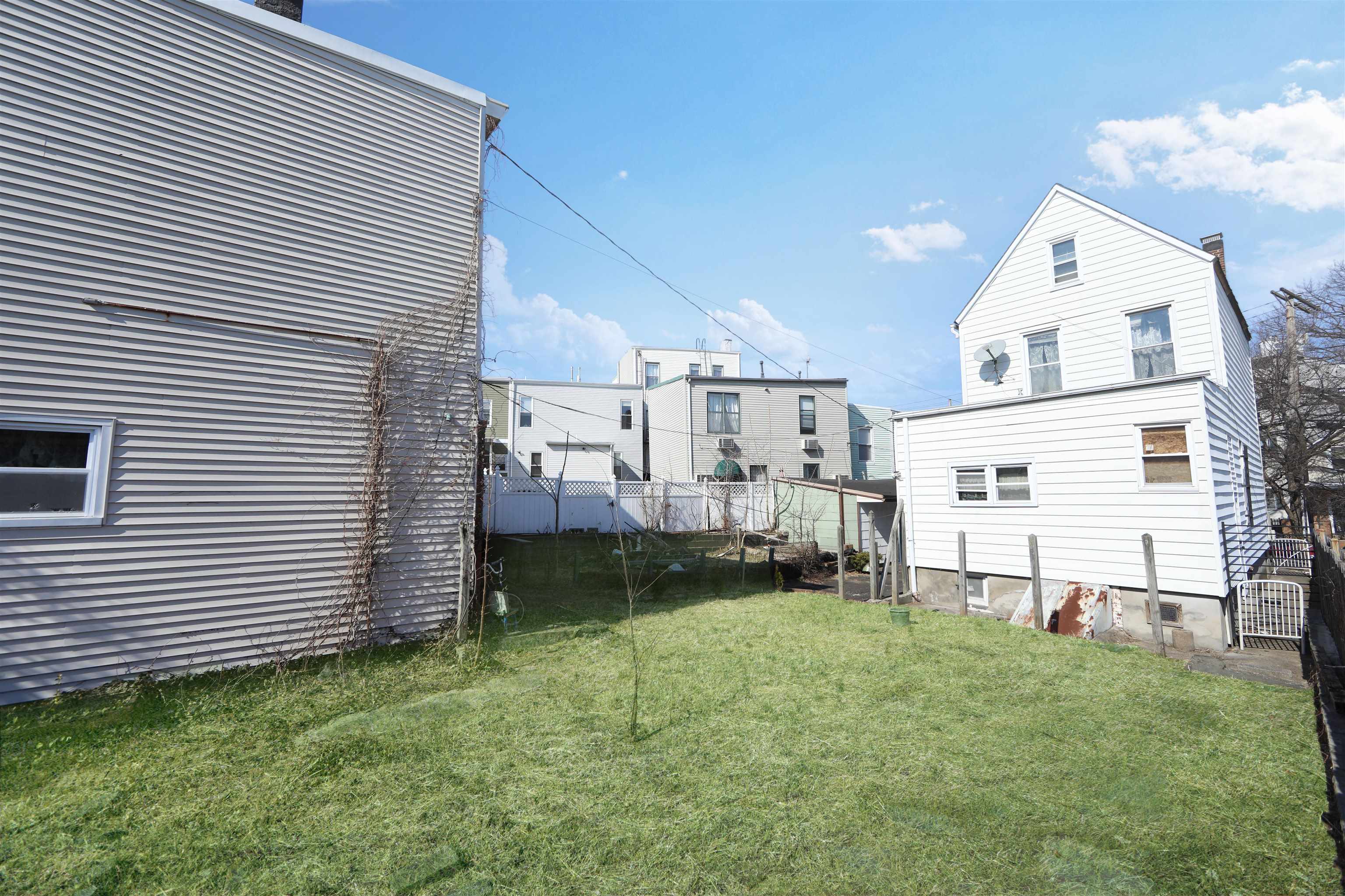 115-117 Hackensack Plank Road Weehawken, NJ 07086 - Photo 23 of 43 a view of a back yard of the house
