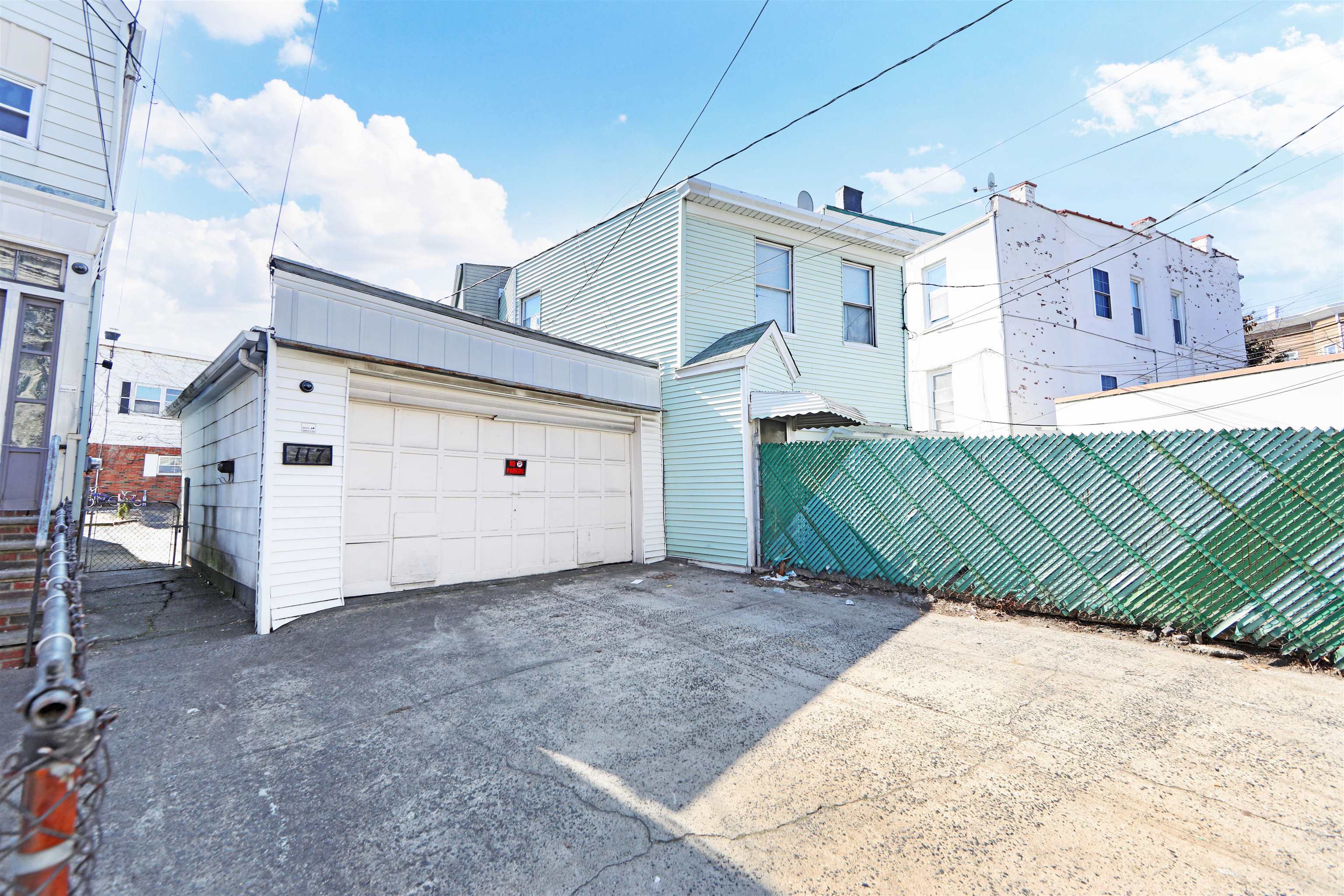 115-117 Hackensack Plank Road Weehawken, NJ 07086 - Photo 24 of 43 a view of a white house