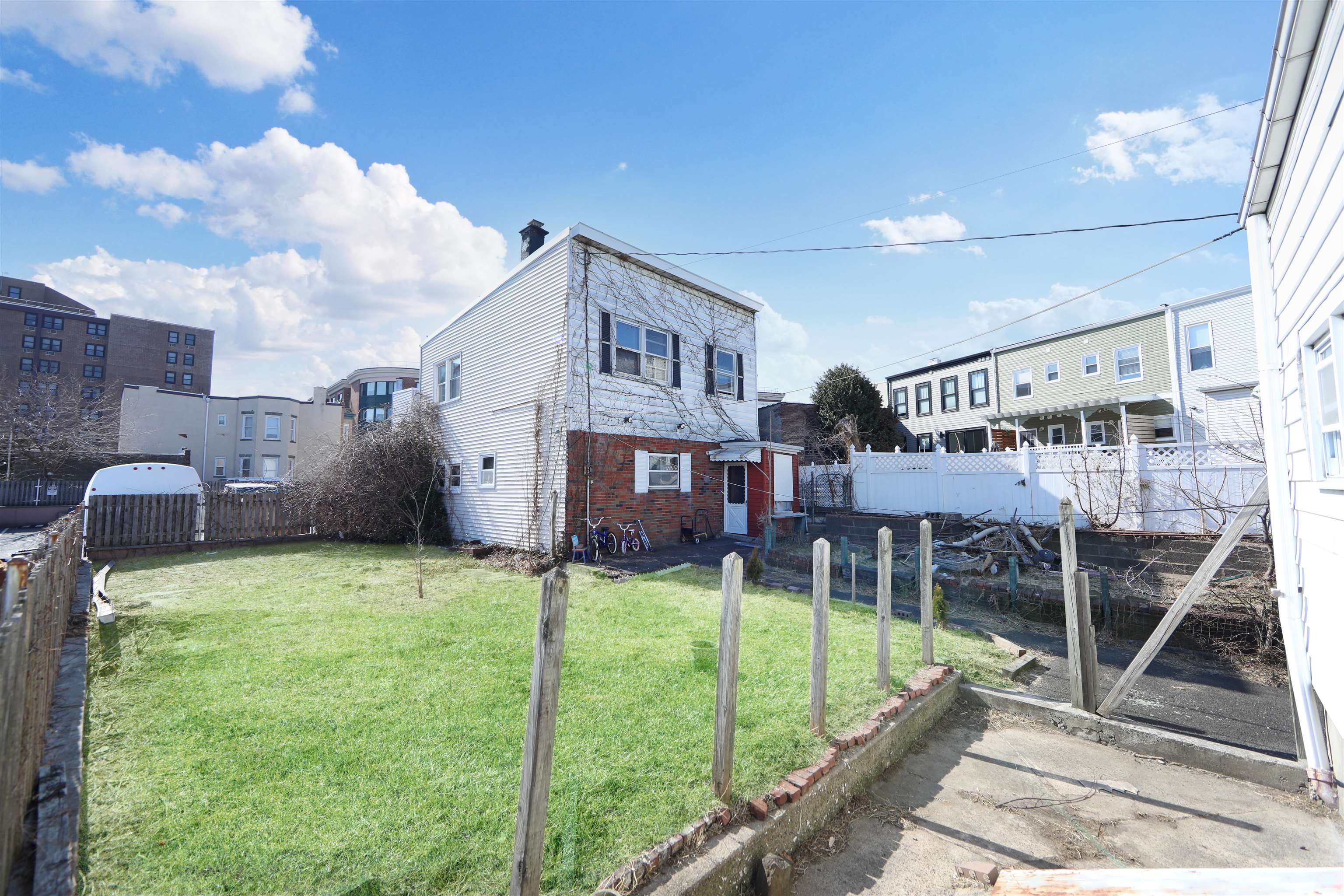 115-117 Hackensack Plank Road Weehawken, NJ 07086 - Photo 25 of 43 a view of a house with backyard and sitting area
