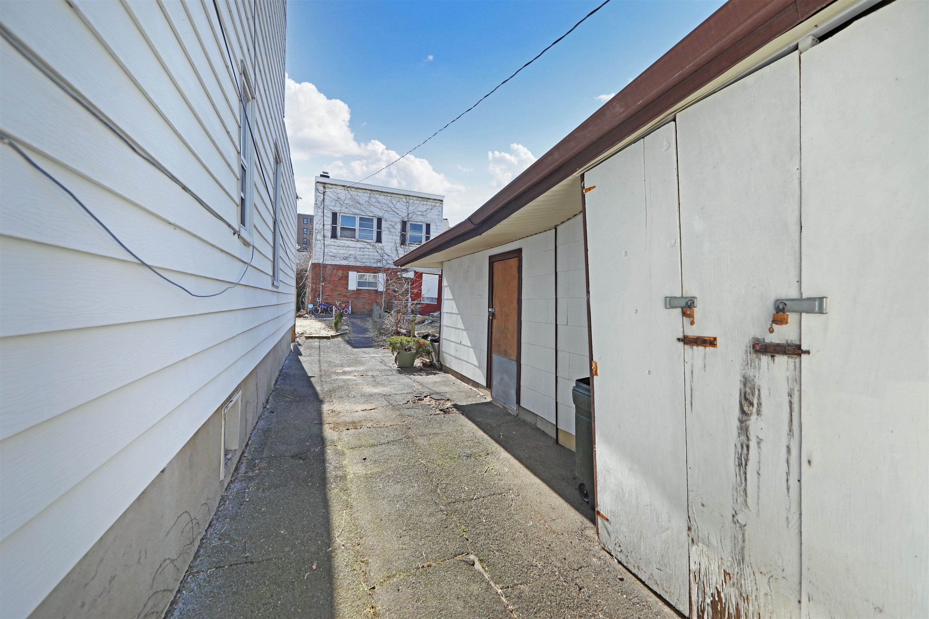 115-117 Hackensack Plank Road Weehawken, NJ 07086 - Photo 26 of 43 a view of a pathway of a house