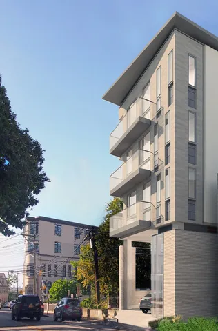 a front view of a building with street view