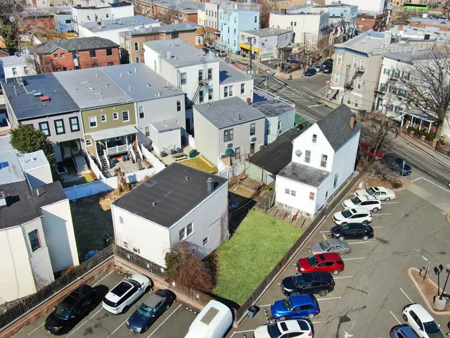 a aerial view of a house with swimming pool