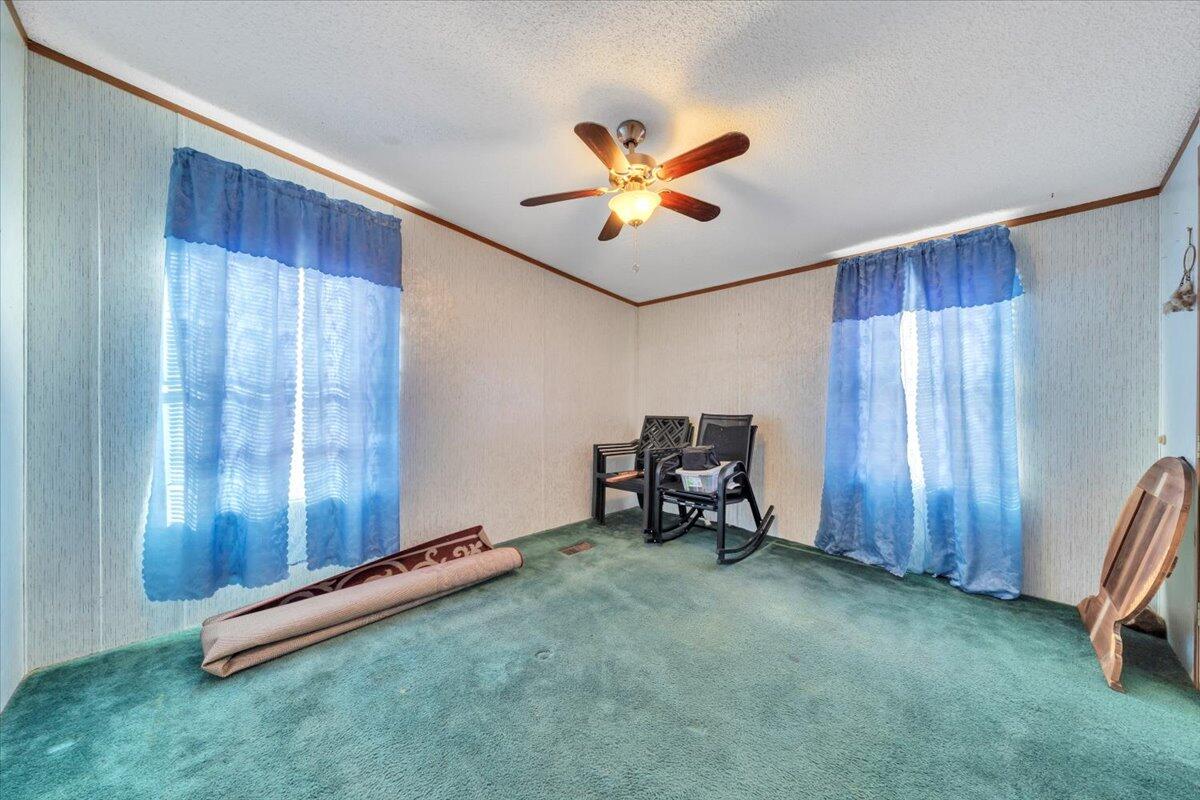 1421 Mob Creek Road Bedford, VA 24523 - Photo 25 of 44 a view of a room with gym equipment and a window