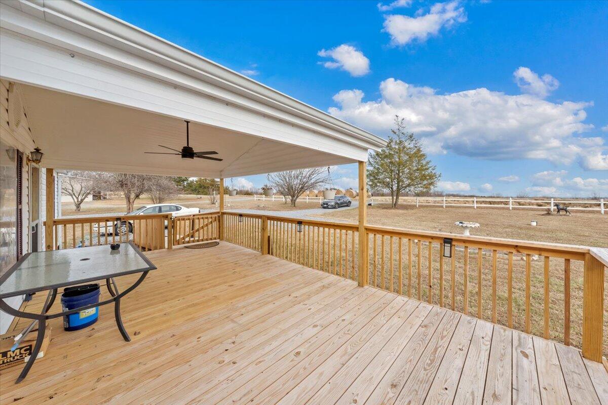 1421 Mob Creek Road Bedford, VA 24523 - Photo 3 of 44 a view of a balcony with wooden floor