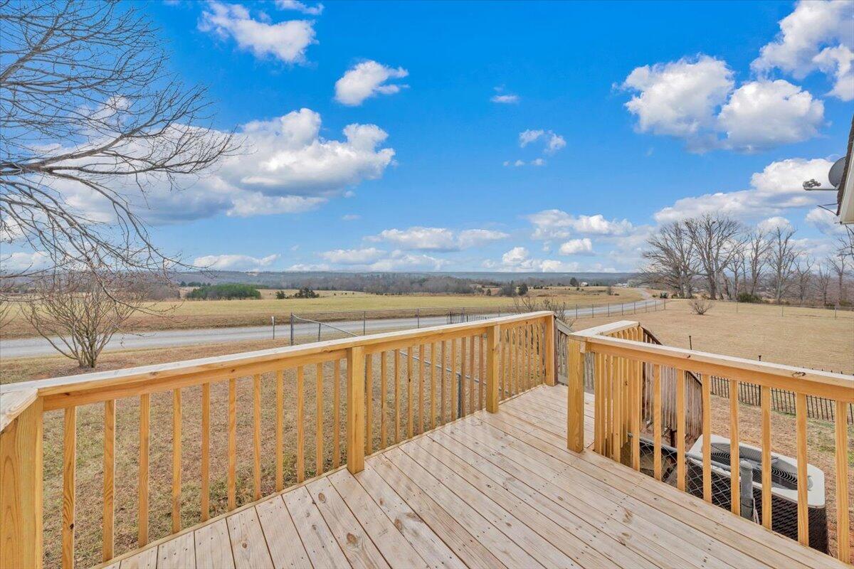 1421 Mob Creek Road Bedford, VA 24523 - Photo 31 of 44 a view of balcony with wooden floor