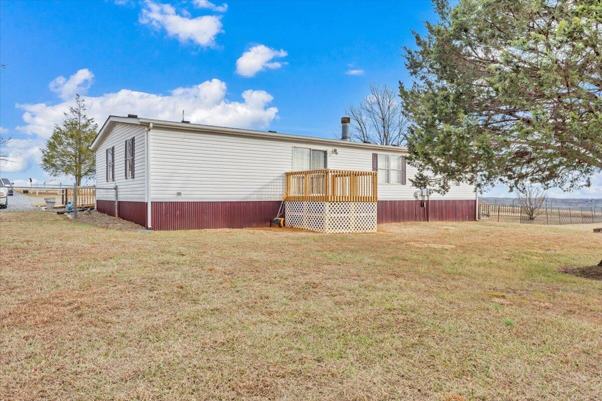 1421 Mob Creek Road Bedford, VA 24523 - Photo 35 of 44 a view of a house with a yard