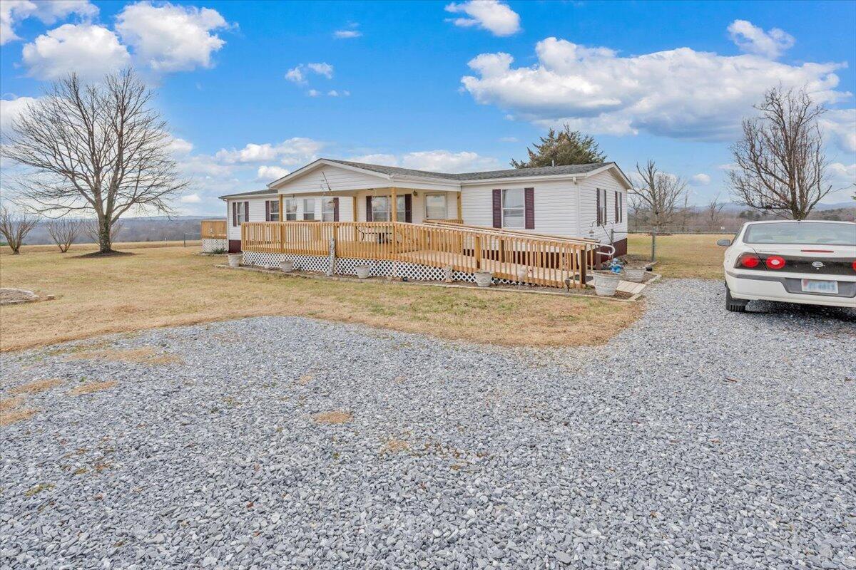 1421 Mob Creek Road Bedford, VA 24523 - Photo 42 of 44 a view of a house with backyard and sitting area