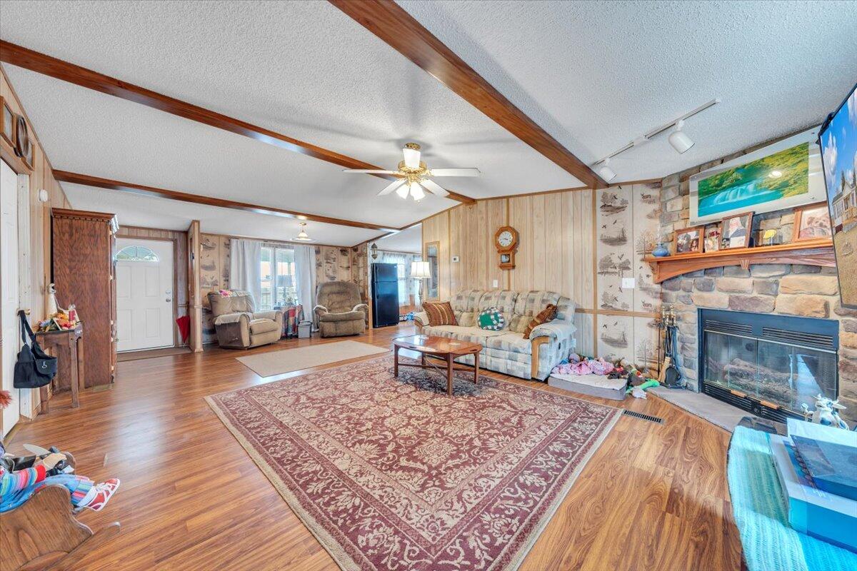 1421 Mob Creek Road Bedford, VA 24523 - Photo 8 of 44 a living room with furniture and a fireplace