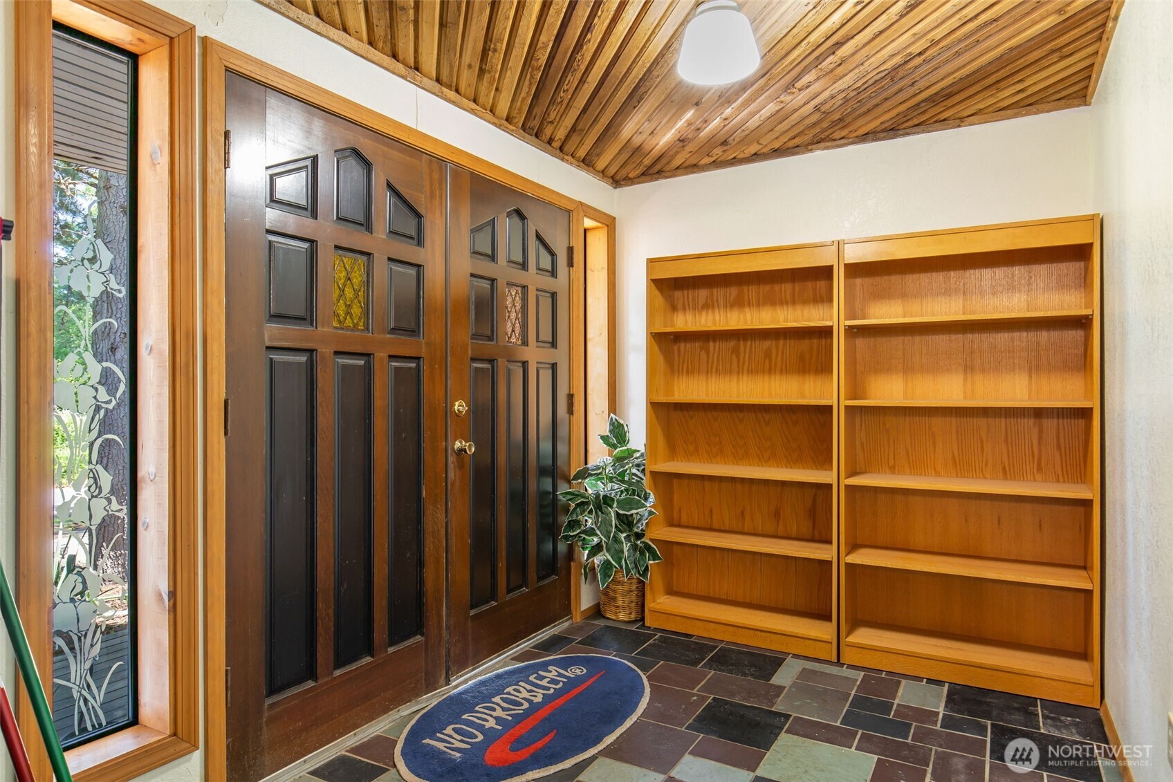 1497 Old Military Road Southeast Tenino, WA 98589 - Photo 4 of 34 a room with a bed and a window