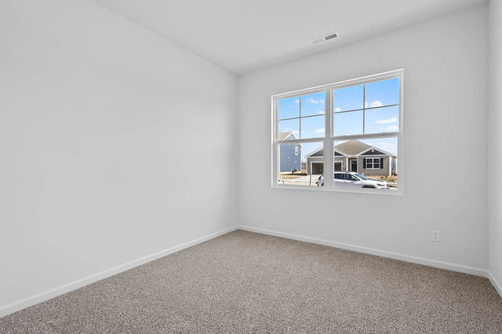 290 Snowdrop Lane Elgin, IL 60124 - Photo 2 of 30 an empty room with a window