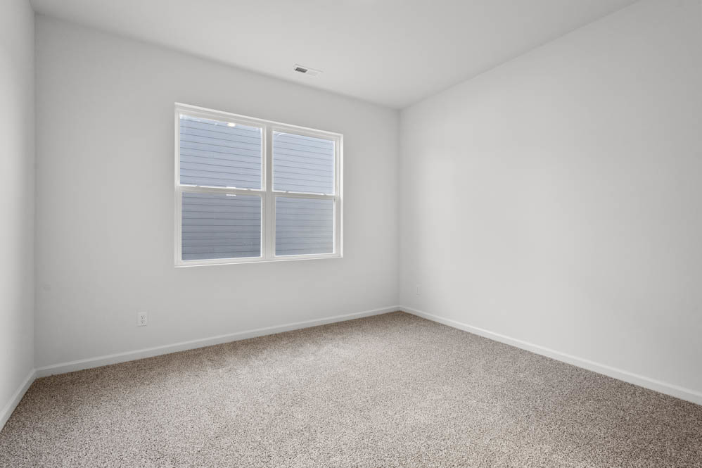 290 Snowdrop Lane Elgin, IL 60124 - Photo 5 of 30 an empty room with a window