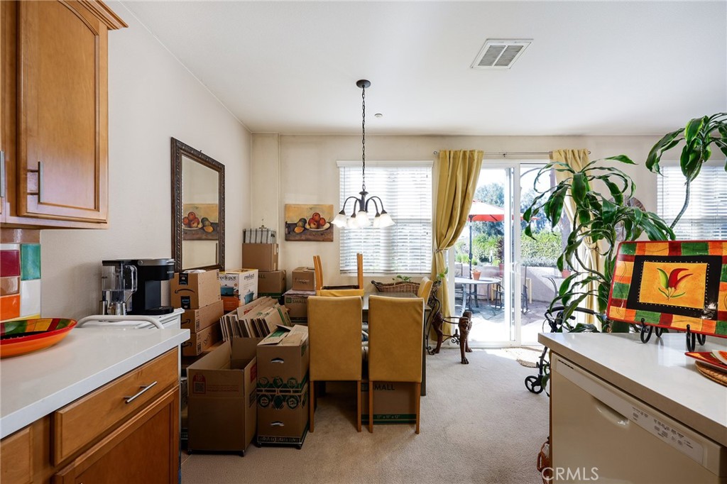 310 Sunset Way, Unit 5 Oceanside, CA 92058 - Photo 16 of 41 a room with gym equipment and a flat screen tv