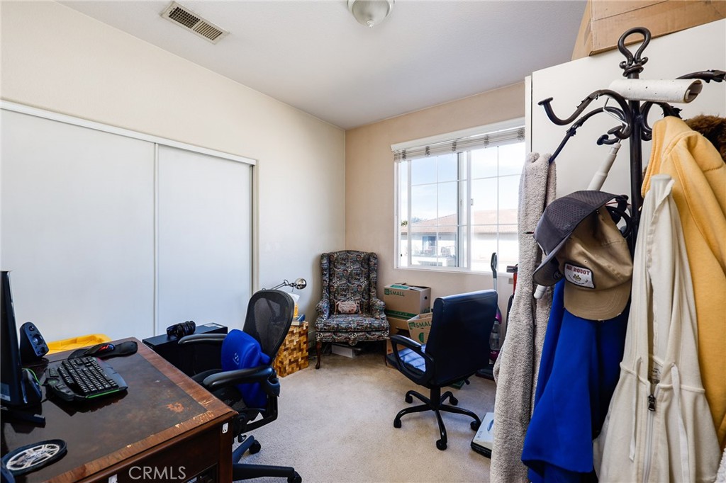 310 Sunset Way, Unit 5 Oceanside, CA 92058 - Photo 30 of 41 a view of a workspace with furniture and a window