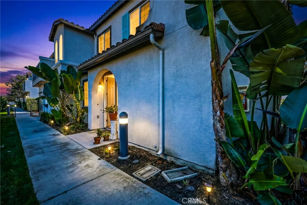 310 Sunset Way, Unit 5 Oceanside, CA 92058 - Photo 3 of 41 a view of an entryway with backyard and garden