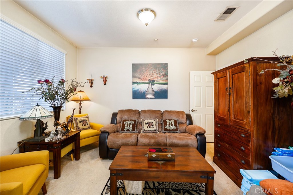 310 Sunset Way, Unit 5 Oceanside, CA 92058 - Photo 10 of 41 a living room with furniture
