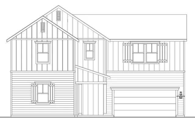 a small white building with a outdoor space