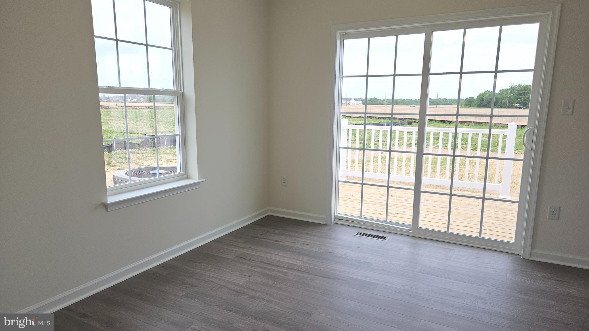 231 Doylestown Road Smyrna, DE 19977 - Photo 7 of 37 Dining Room - Slider to Deck