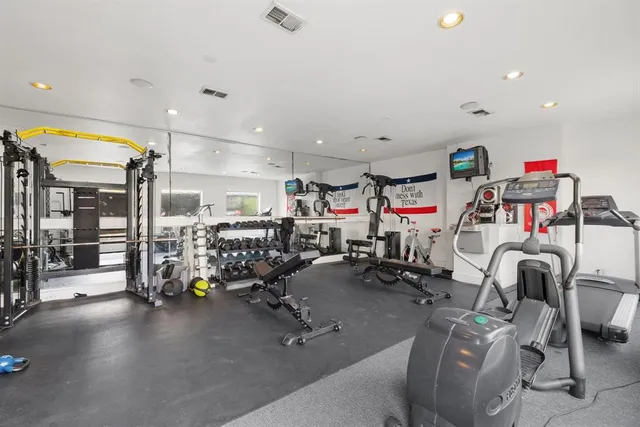a view of a room with gym equipment