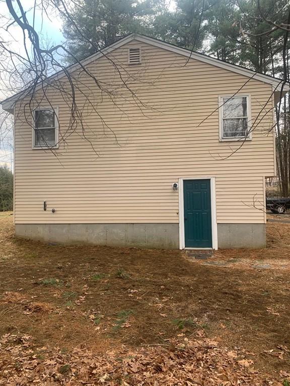 4 Bethany Drive Rutland, MA 01543 - Photo 3 of 22 a view of a backyard of the house