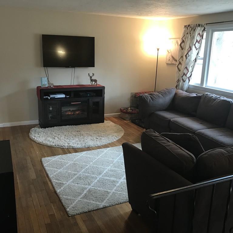 4 Bethany Drive Rutland, MA 01543 - Photo 4 of 22 a living room with furniture and a flat screen tv