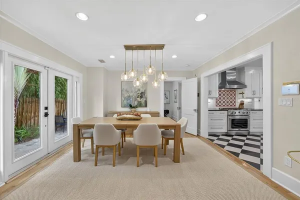 a kitchen with stainless steel appliances granite countertop a stove a refrigerator and a granite counter tops