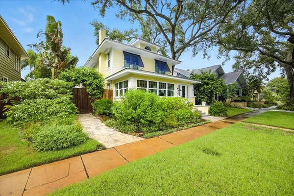an aerial view of a city with lots of residential buildings