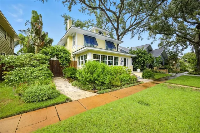an aerial view of a city with lots of residential buildings