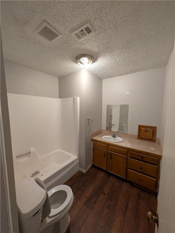 4104 Marsh Street Bryan, TX 77803 - Photo 12 of 17 a bathroom with a tub sink toilet and mirror
